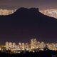 “My Home My City.” Lion Rock rises above Hong Kong.